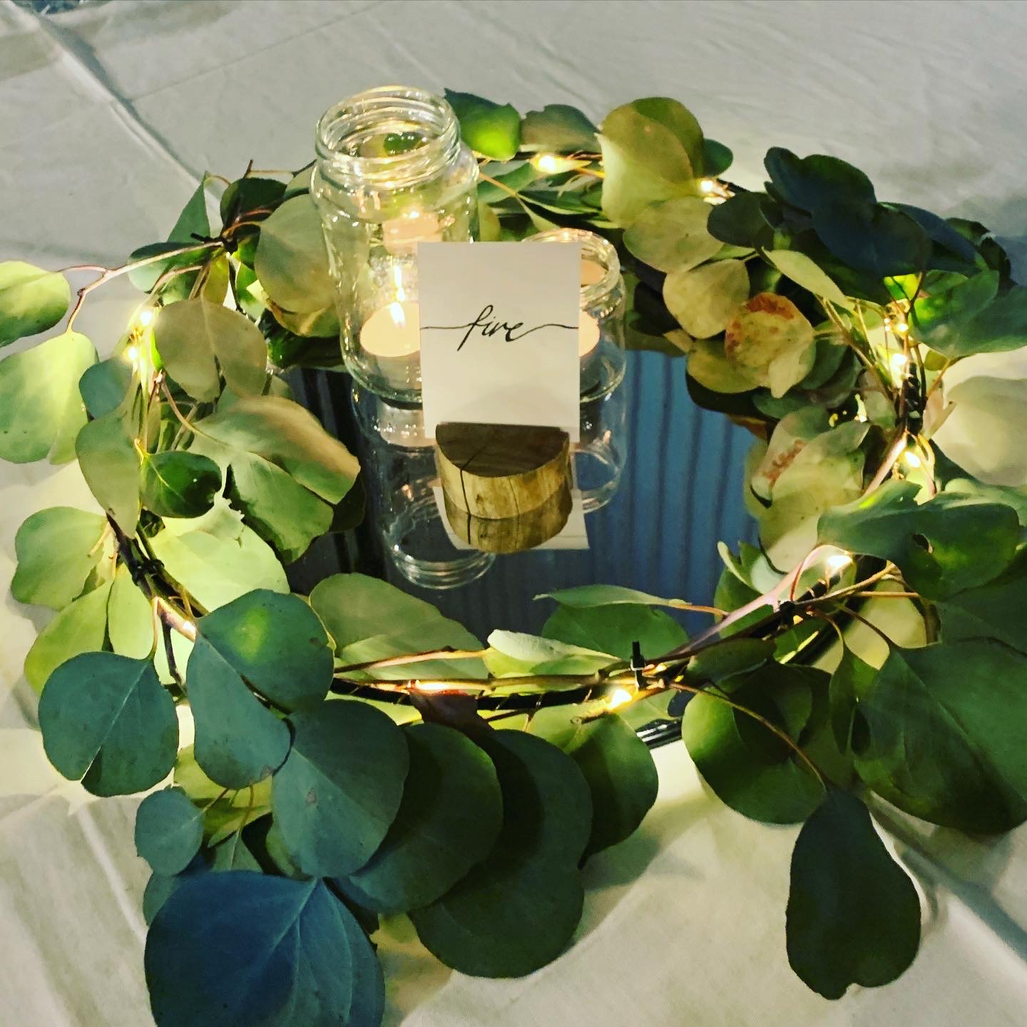Greenery and candle table detail