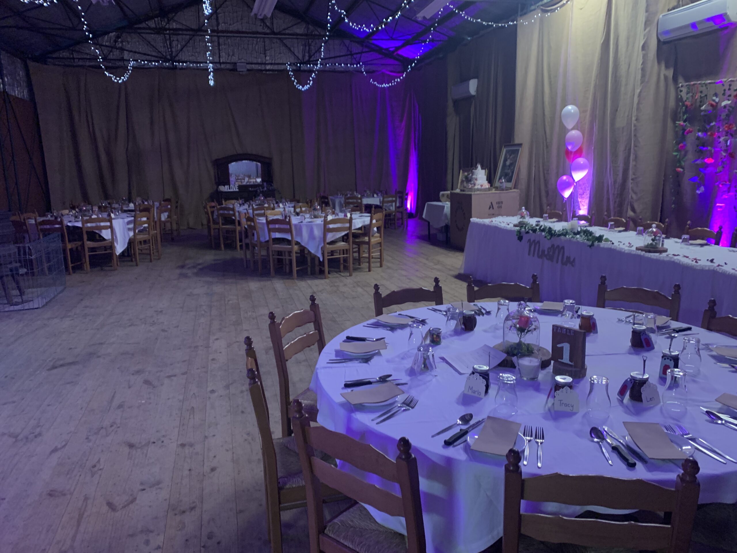 The room at night, tables set